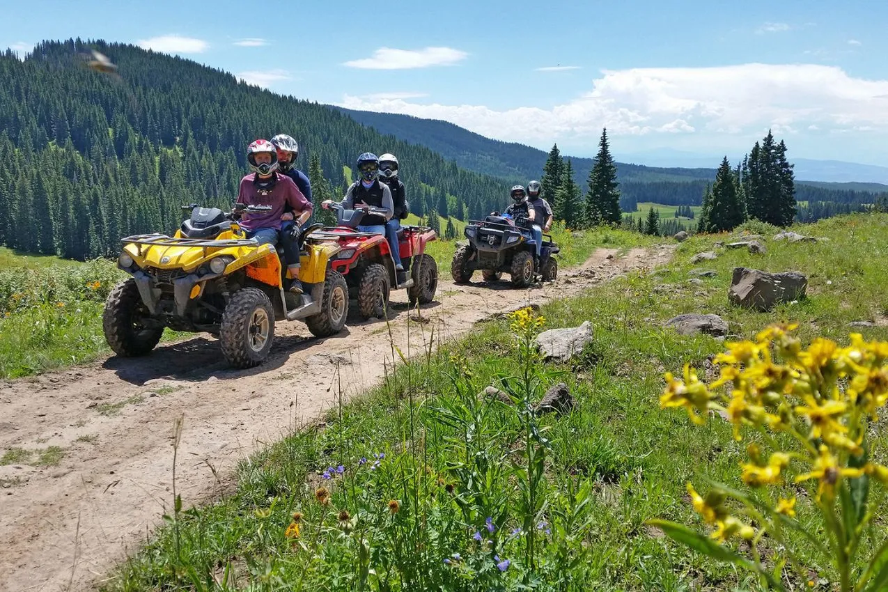 People in the Poconos enjoying riding ATVs