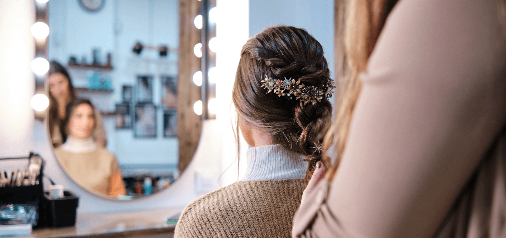 A girl displaying her hairstyle prior to prom