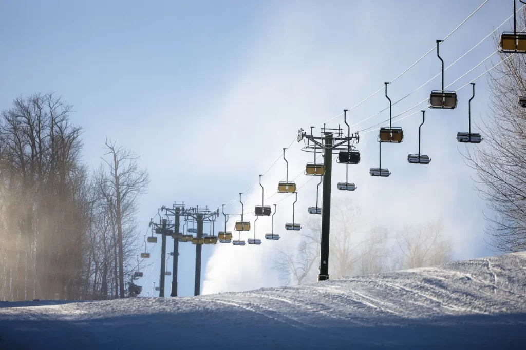 a breathtaking view of multiple ski lifts, ready to take you up on your skiing adventure in the Poconos
