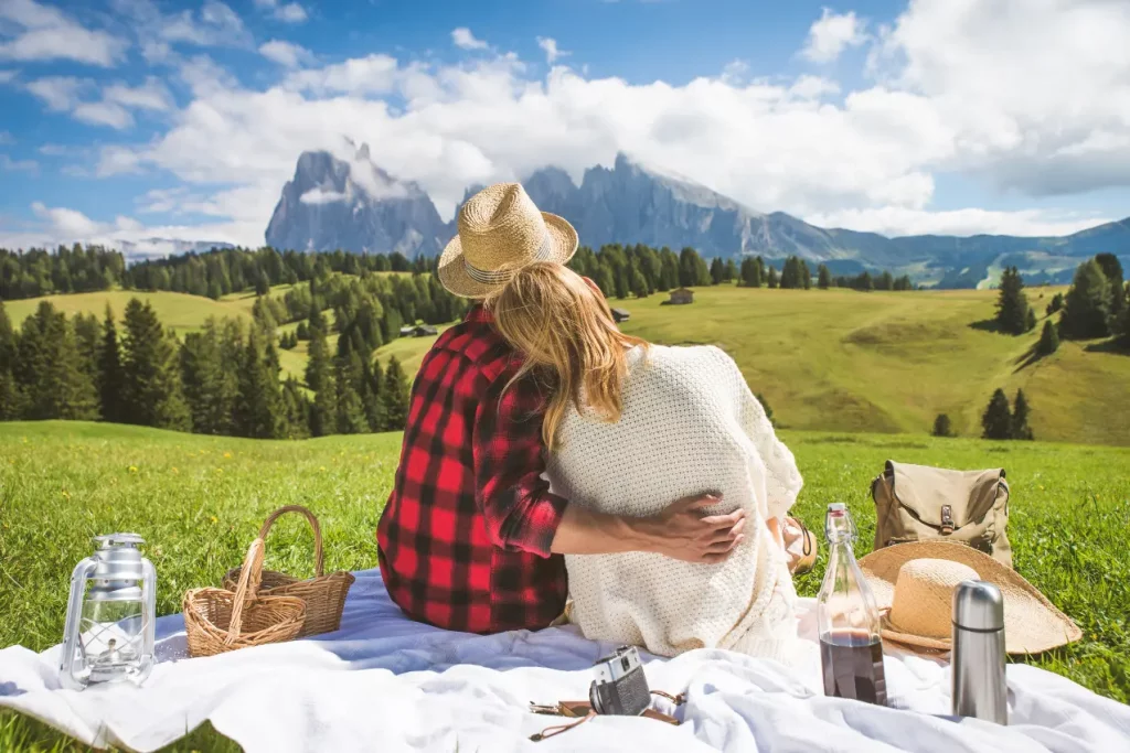 A couple enjoying a romantic weekend in the Poconos, a scenic forest trail on hilly places.